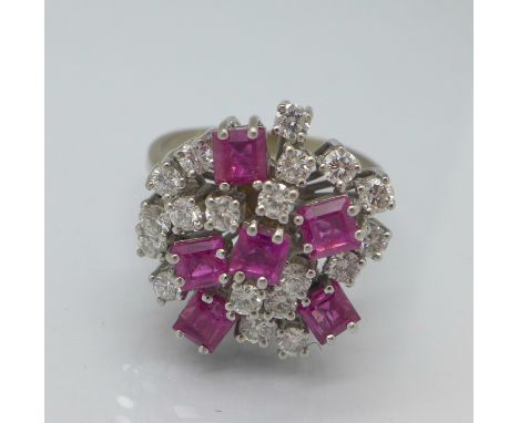 A white metal set, diamond and ruby ring, set with nineteen diamonds and six square rubies, 8.2g, R