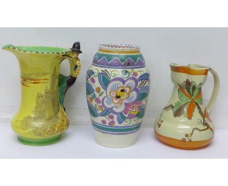 A Poole Pottery vase, a Wade Heath jug and a Burleigh jug, Poole 21cm