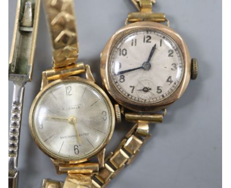 Two lady's 9ct gold cased manual wind wrist watches on gold plated straps, gross 28.9 grams.