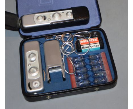 A Minox minocolour cased camera and another Minox miniature camera