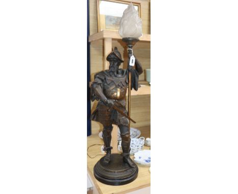 A gilt spelter warrior lamp with shade