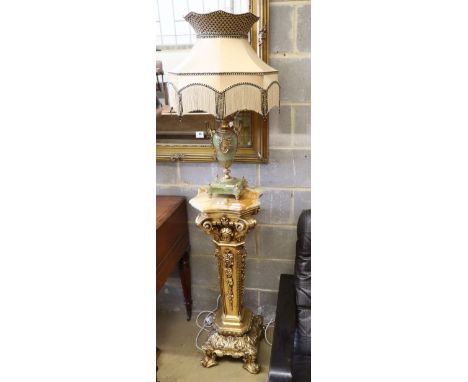 A Harrods gilt pedestal and an onyx lamp with shade, pedestal H.96cm