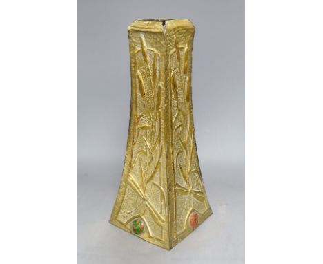An Art Nouveau brass vase with multi coloured ceramic cartouches, height 40cm