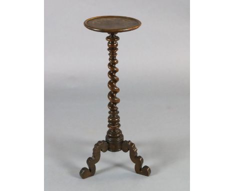 A late 17th century Dutch walnut candle stand, with floral marquetry decorated top and barley twist stem, on scrolled tripod,