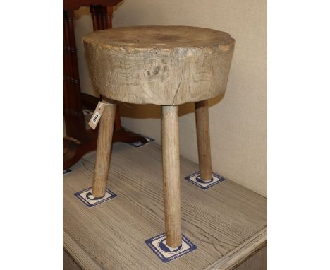 A French primitive stool, c.1840, 35cm diameter, H.46cm