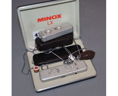 A cased Minox LC camera outfit and 36 exposure camera and case (2)