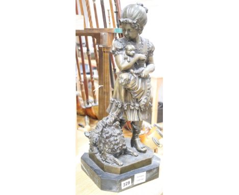 A modern bronze of a girl with a dog and puppies, height 51cm