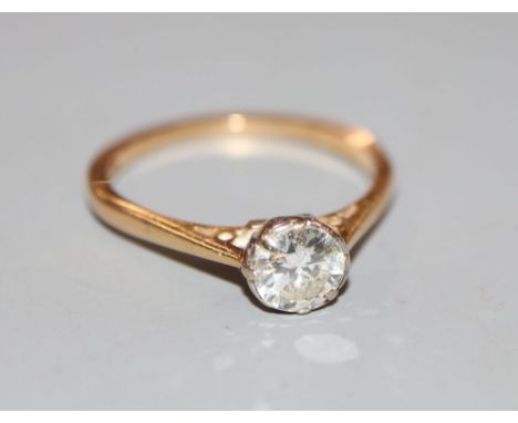 An 18ct and solitaire diamond ring, size N, gross 2.5 grams.CONDITION: Stone approx. 0.50ct. Colour and clarity approximately