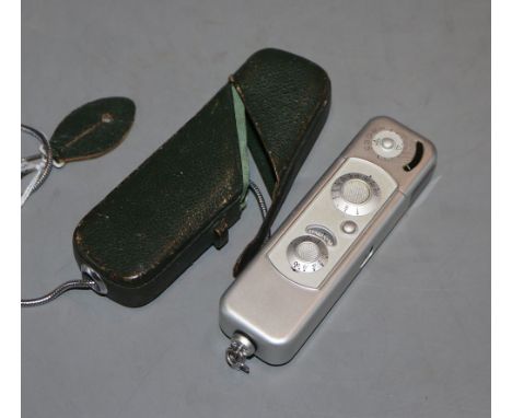 A Minox camera, cased