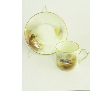 A ROYAL WORCESTER COFFEE CAN AND SAUCER PAINTED BY JAS STINTON SIGNED, WITH BIRDS, BLACK PRINTED MARK