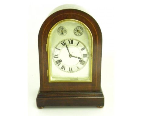 A GERMAN MAHOGANY MANTLE CLOCK IN ARCHED CASE, C1910