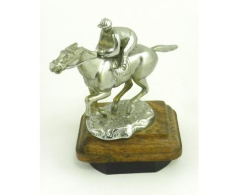 VINTAGE MOTORING. A DESMO CHROMIUM PLATED BRASS HORSE AND JOCKEY CAR MASCOT MARKED DESMO COPYRIGHT, 1930S