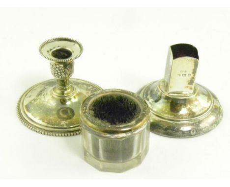 AN AMERICAN SILVER TAPER STICK WITH BEADED RIMS, A SILVER RIMMED GLASS PEN NIB BRUSH AND A SILVER SEALING WAX STAND, THE LAST