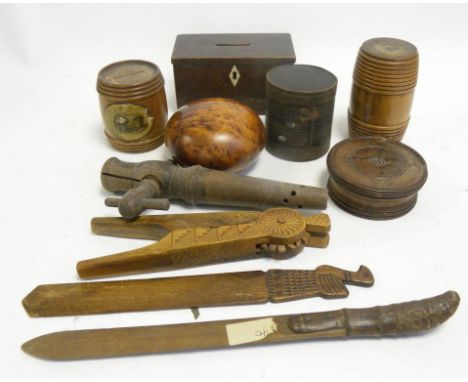 A SMALL COLLECTION OF VINTAGE TREEN INCLUDING CHIP CARVED NUT CRACKS A SPIGOT, BOXES AND TWO BANKS
