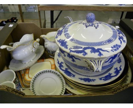 A ROYAL CAULDON BLUE PRINTED EARTHENWARE DRAGON SERIES SOUP TUREEN, COVER, STAND AND LADLE, A MODERN COALPORT IRONBRIDGE JUG 