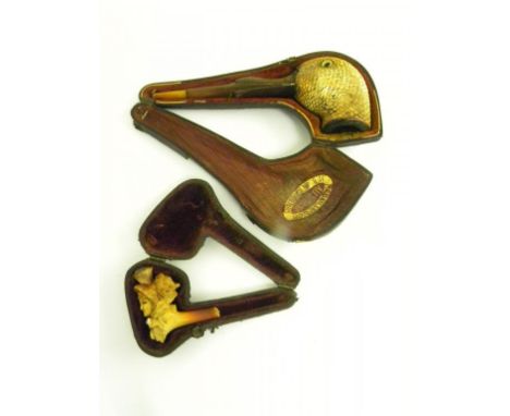 A MEERSCHAUM GLASS EYED DUCK'S HEAD NOVELTY TOBACCO PIPE WITH AMBER MOUTHPIECE, CASED AND A MEERSCHAUM CHEROOT HOLDER CARVED 