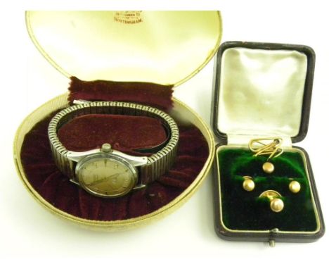 A ROTARY STAINLESS STEEL GENTLEMAN'S WRISTWATCH AND A 9CT GOLD DRESS SET, 4.6G