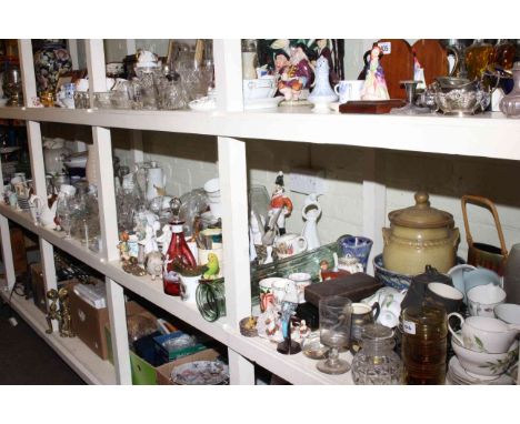 Full shelf of glass, china, teawares, figurines, Victorian ruby glass decanter, etc