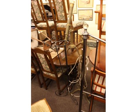 Brass standard lamp, brass telescope, copper lantern light and wrought metal plant stand (4)