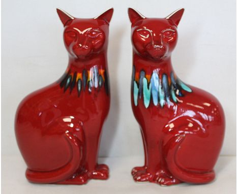 Pair of Poole Pottery red Delphis cats, each 29cm high, each stamped Poole England.&nbsp; (2). 