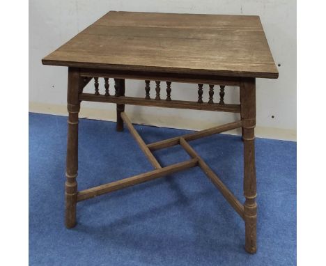 Early Arts & Crafts oak occasional table attributed to Philip Webb, the square planked top, approx. 66cm x 66cm, above bobbin