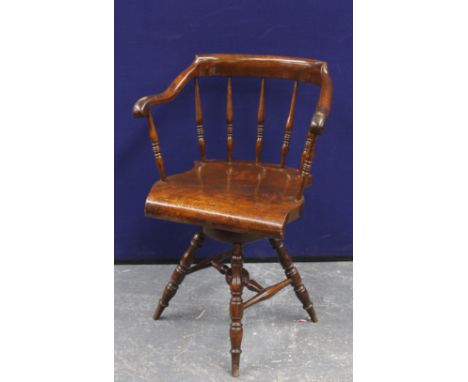 Victorian mahogany swivel office chair raised on bobbin supports 