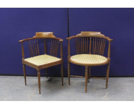 Two mahogany corner chairs with reeded stick back supports and satinwood inlaid banding, on columnal supports. 