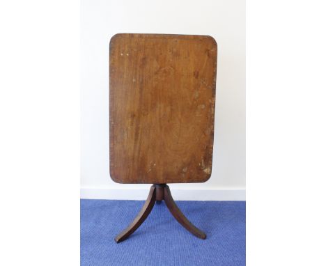 Regency inlaid mahogany occasional table the rounded rectangular top on turned column and downswept tripod supports, 69cm hig