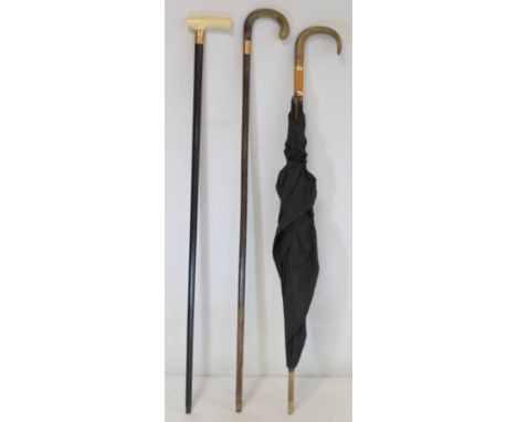 Late Victorian ebonised walking stick with ivory handle and 9ct gold mount with monogrammed initials, dated 1899, 22cm long; 