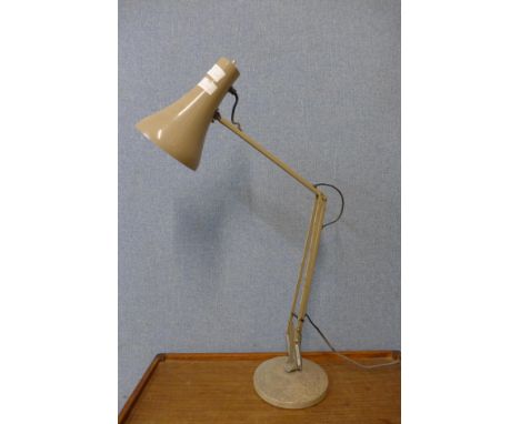 A grey metal anglepoise desk lamp 