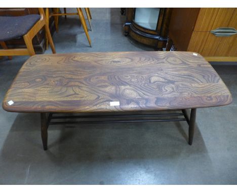 An Ercol elm and beech Windsor coffee table 