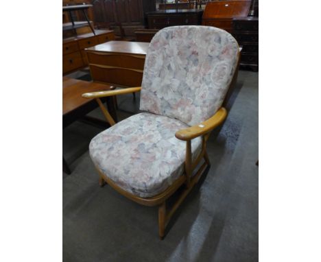 An Ercol Blonde elm and beech Windsor armchair 