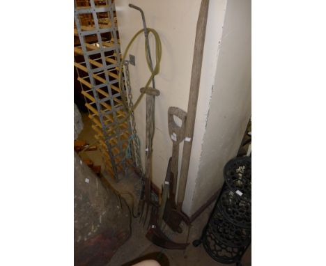 Assorted vintage garden tools including spade, pitchfork, etc. 