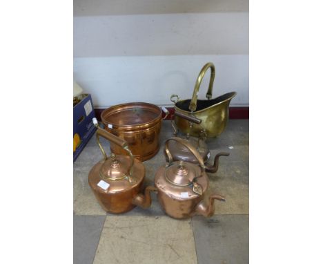 Three copper kettles, copper planter and a brass coal scuttle 