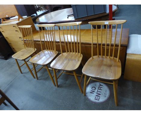 A set of four Ercol style elm and beech kitchen chairs 