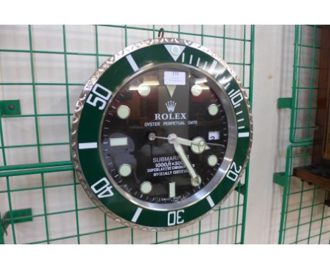 A Rolex style dealer's wall clock 