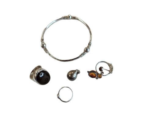 SILVER BANGLE AND 3 SILVER RINGS