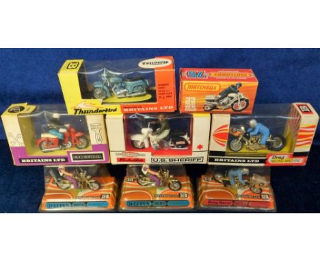 Model Motorcycles, 7 boxed Britain's model motorcycles, 1:32 scale. U.S. Sheriff (9692), 2 X Drag Racing Machine (9683 in dif