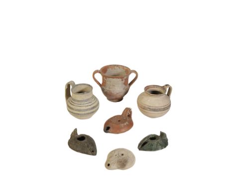 AN ANCIENT CYPRIOT JUGLET, the body decorated with concentric lines, another ancient vessel decorated with concentric lines, 