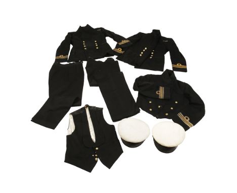 POST SECOND WORLD WAR NAVY UNIFORMS contained in a Japanned military trunk belonging to A.H.Stratfield, also containing ribbo