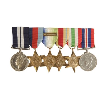 THE REMARKABLE D -DAY DISTINGUISHED SERVICE MEDAL GROUP TO STOKER 1ST CLASS LEGGOT, the sole survivor of his LCA off Gold Bea