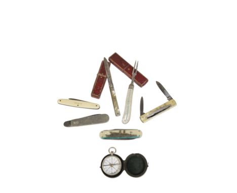 FOUR VARIOUS SHIPPING LINE PENKNIFES other pen knifes and a compass. Provenance: The Peter Newall Collection of Maritime Memo