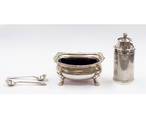 A Georgian style silver salt, gadroon and floral border on four shell and paw feet, blue glass liner by Adie Brothers, Birmin