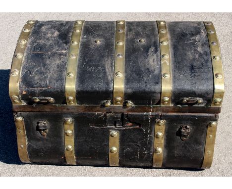 A late 18th to early 19th Century Military leather bound trunk, 44cm high, 71cm wide, 47cm deep