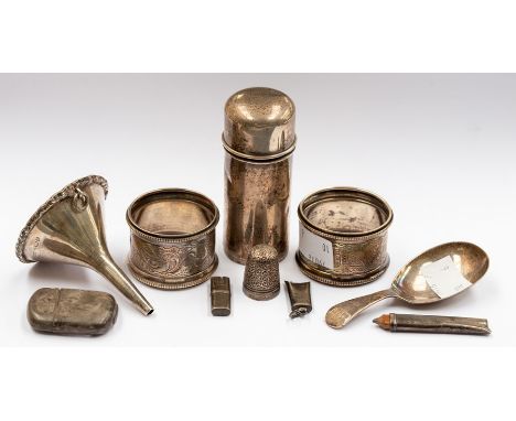 A group of silver including: two various napkin rings; small wine funnel; caddy spoon; vesta case, cylindrical scent bottle h
