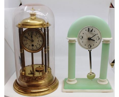An Art Deco style clock plus an Anniversary clock under a dome