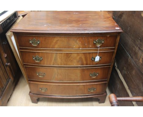 A George III style mahogany bow fronted chest of drawers, late 20th Century, comprising four long graduated drawers, raised o