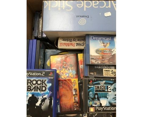 Video games; large quantity including Sega, Dreamcast, Playstation etc along with PS1 and Dreamcast arcade stick (3 boxes)