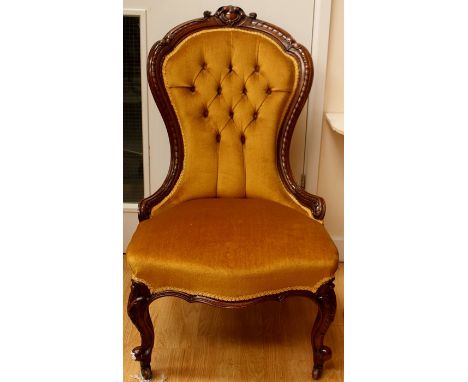 A late Victorian ladies chair, button back, cabriole legs, 91cm high, 55cm wide, 53cm deep
