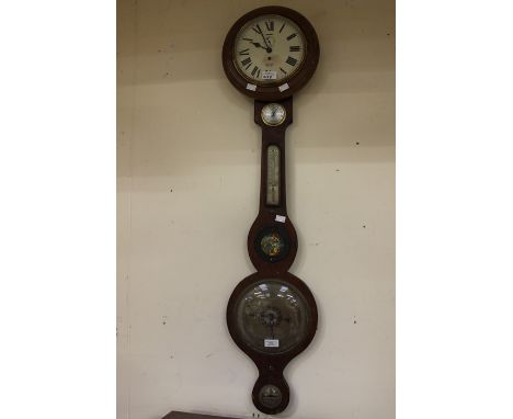 A Smiths Empire oak 7-day movement wall clock with Roman numerals, together with an early 20th century oak barometer with Jap